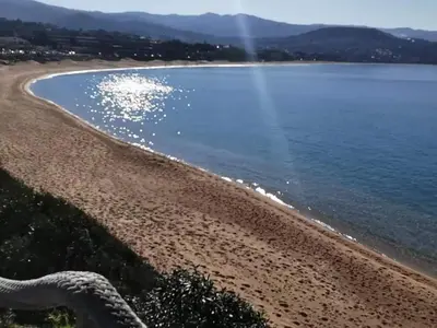 a view of the shoreline of a beach at Studio 150 m de la plage Agosta in Albitreccia