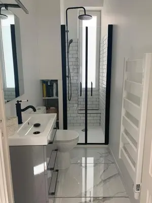 a bathroom with a shower and a toilet and a sink at Superbe appartement centre ville Ajaccio in Ajaccio