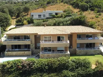 an aerial view of a house at Grand appartement T4, piscine, vue exceptionnelle à 50 m de la plage in Propriano