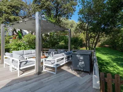 a patio with a gazebo and a grill at Villa Villa Romana by Interhome in Porto-Vecchio