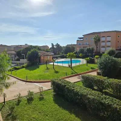 Palmeraie 406- vue piscine- clim- proche plage et commerces