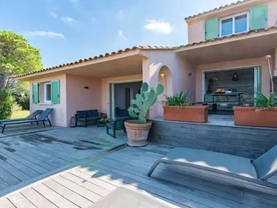 a villa with a patio and a house at Holiday Home Verde by Interhome in Porto-Vecchio