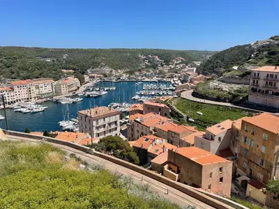 a view of a harbor with boats in the water at Appartement meublé Porto vecchio in Porto-Vecchio