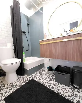 a bathroom with a toilet and a tub and a sink at Corte tres beau T2 neuf hyper centre 4 personnes calme et lumineux wifi lave linge in Corte