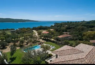 an aerial view of a house and the water at A Liccia in Pianottoli-Caldarello