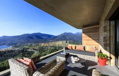 a balcony with a view of the mountains at Villa Supranu in Viggianello