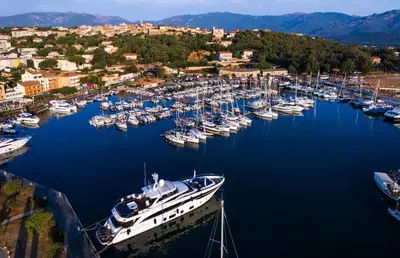 an aerial view of a marina with boats in the water at I Vaddi in Porto-Vecchio