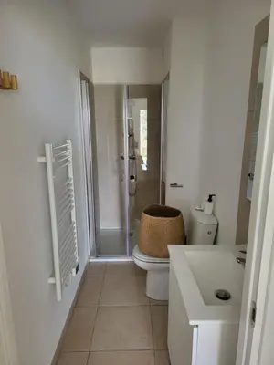 a bathroom with a shower and a toilet and a sink at Residence Marina di Bravone in Linguizzetta