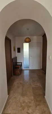 an empty hallway with an archway in a house at Villa de standing Les Amandiers, vue mer & piscine in Propriano