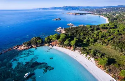 an aerial view of a beach and the ocean at Villa Baccarat in Porto-Vecchio