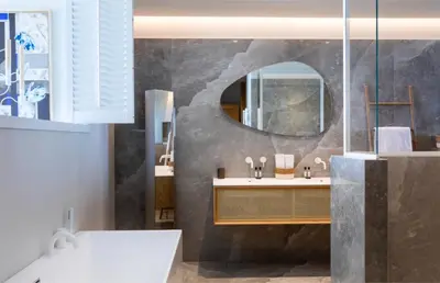a bathroom with a sink and a mirror at Villa Nuciola in Lecci