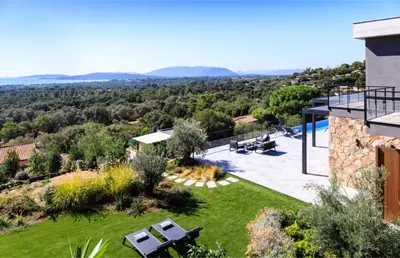 an image of a house with a garden at Villa Nuciola in Lecci