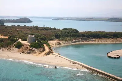 an aerial view of an island in a body of water at Monte Santu T2 in Prunelli-di-Fiumorbo