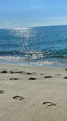 an image of footprints in the sand on the beach at CASA MARE in Ghisonaccia
