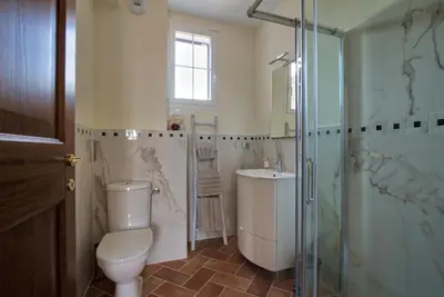 a bathroom with a toilet and a shower and a sink at Le Domaine Saint François La Tour 1 in Ajaccio