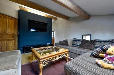 a living room with a couch and a coffee table at casa teppe rosse in Aléria