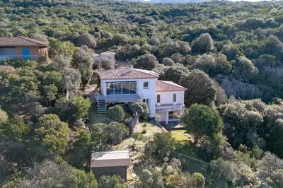an aerial view of a house in the forest at L'Orangeraie de Portigliolo - Vue mer 4 chambres in Coti-Chiavari