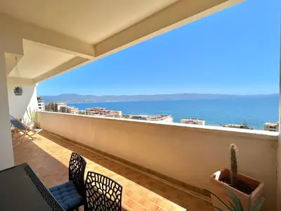 a balcony with a view of the ocean at Appartement le Sicile sanguinaires Ajaccio in Ajaccio