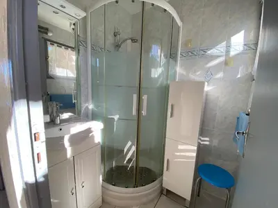 a bathroom with a shower and a sink at Appartement 102 Terra Bella 1 Porticcio in Porticcio