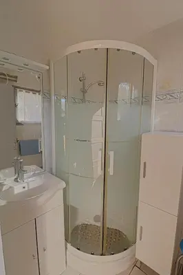 a bathroom with a shower and a sink at Appartement 102 Terra Bella 1 Porticcio in Porticcio