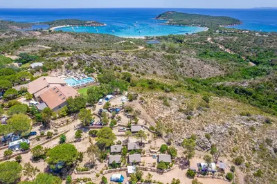 an aerial view of the resort and the beach at Camping Rondinara in Bonifacio