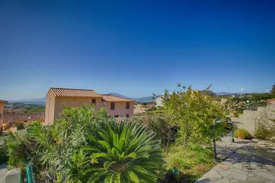 a view of a villa from the garden of a house at Villa Terra Bella 2 PORTICCIO in Porticcio