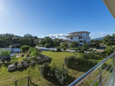 a view of the garden from the balcony of a house at Apartment Domaine d'Arca G7 by Interhome in Porto-Vecchio