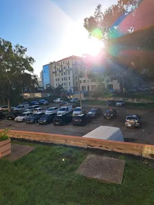 a parking lot with a lot of cars parked at Casa D'Amore T3 in Ajaccio