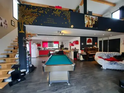 a living room with a pool table in it at Chez Cendra in Borgo