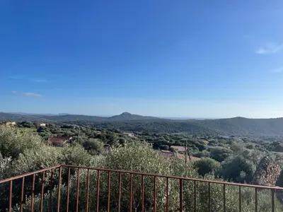 a view of a valley with mountains in the distance at Villa proche plage extrême sud Corse in Monacia-dʼAullène