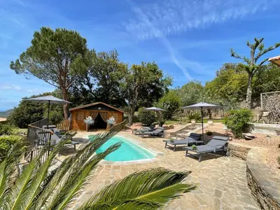 a villa with a pool and a house at Carpediem corsica adult only in Poggio-dʼOletta
