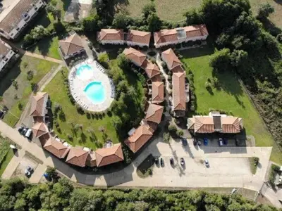 an aerial view of a house with a swimming pool at Chez Laurence et Fabien in Santa-Maria-Poggio