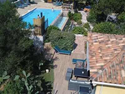 an aerial view of a swimming pool in a house at Cap Martin. in Lecci