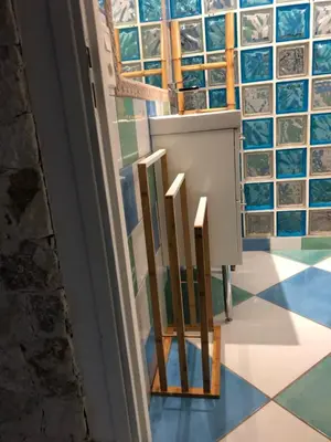 a room with four wooden chairs in front of a window at Cap Martin. in Lecci
