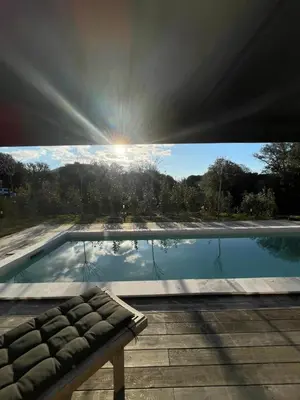 a view of a swimming pool from the roof of a house at Maison de campagne entre Ajaccio et Porticcio in Cauro