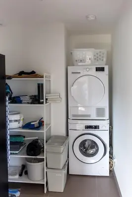 a laundry room with a washer and a washing machine at Domaine d'Arca - Gauguin 12 - 6 pers in Porto-Vecchio