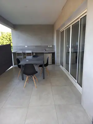 a dining room with a table and chairs in a room at Casa di l Alivetu in Ventiseri