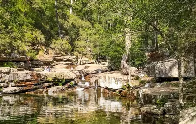 a painting of a river with rocks and trees at 3 Bedroom Stunning Home In Marignana in Marignana