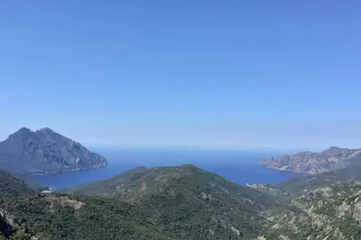 a view of the ocean from the mountains at Gîte E Curtaline in Speloncato