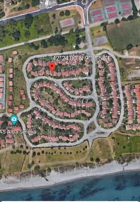 a map of a parking lot with a red spot at Villa les pieds dans l'eau résidence calme in Poggio-Mezzana