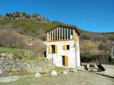 a house under construction on top of a hill at U MULINU in Moïta