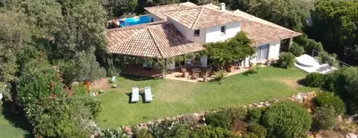 an aerial view of a house with a swimming pool at Villa classée 5* 7 chambres piscine spa plage à 5' in Sainte-Lucie de Porto-Vecchio