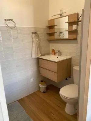 a bathroom with a sink and a toilet at DOLCE VITA-Calme-Vue Mer in Chiatra