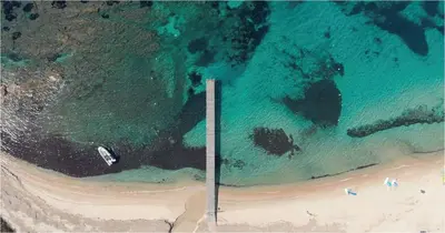 an overhead view of a beach and the ocean at Appartement Bella Vista 302 Porticcio in Porticcio