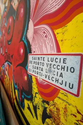a book with a sticker on the side of it at Villa Lavu Santu piscine privée vue mer/montagnes in Zonza