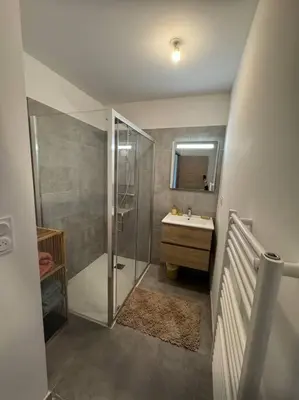 a bathroom with a shower and a sink at Maison Joepolly corsica in Bonifacio