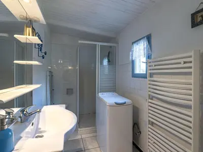 a bathroom with a sink and a toilet and a shower at Apartment Santa by Interhome in Porto-Vecchio