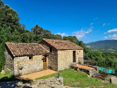 an old stone house with a swimming pool at BERGERIE DE 1770 AVEC PISCINE in Sartène