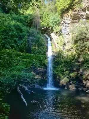 a waterfall in the middle of a river at I Tre Taglincchi, U Terzu - Proche mer, Clim, Wifi, Parking gratuit in Taglio-Isolaccio