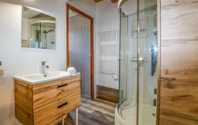a bathroom with a sink and a shower at Casaperta Aleria in Pancheraccia